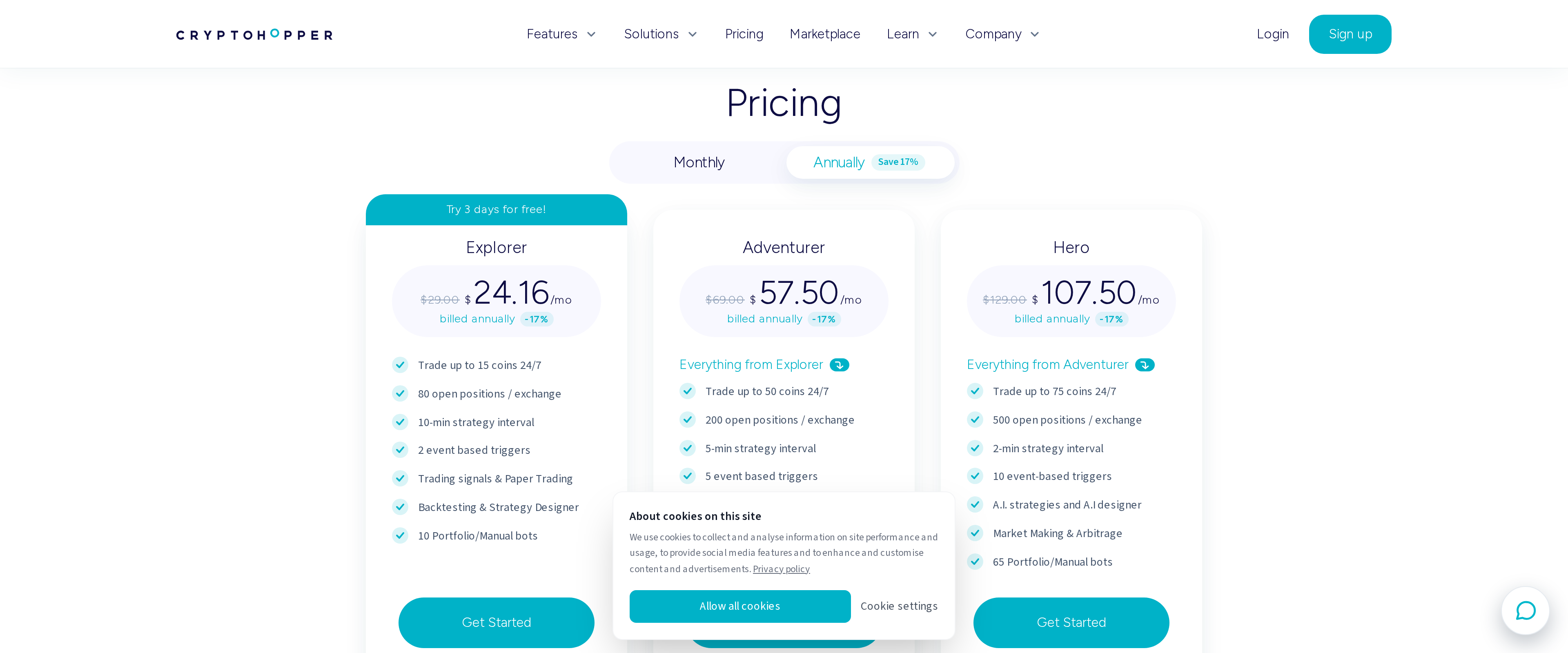 Cryptohopper's pricing page showing three plans, Explorer at $29, Adventurer at $69 and Hero at $129, with feature comparisons including trading signals and paper trading